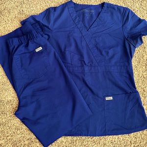 Greys Anatomy navy scrubs.